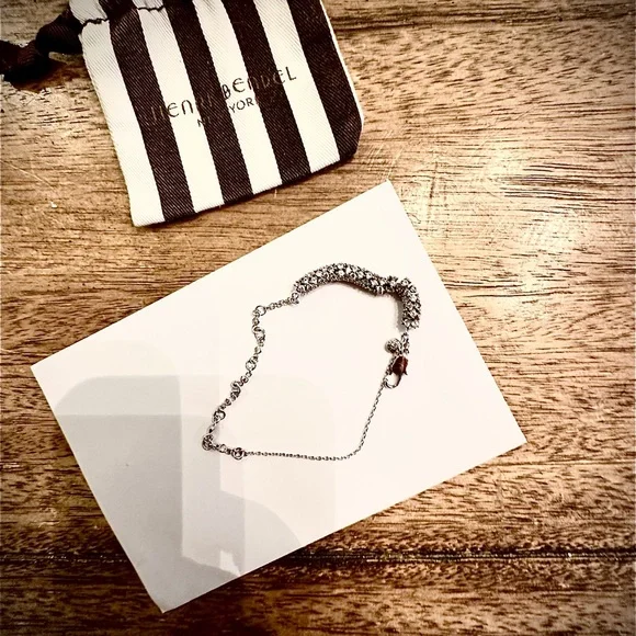 Gorgeous HENRI BENDEL Sparkly Rhinestone, Silver Infinity Bracelet - Picture 8 of 11